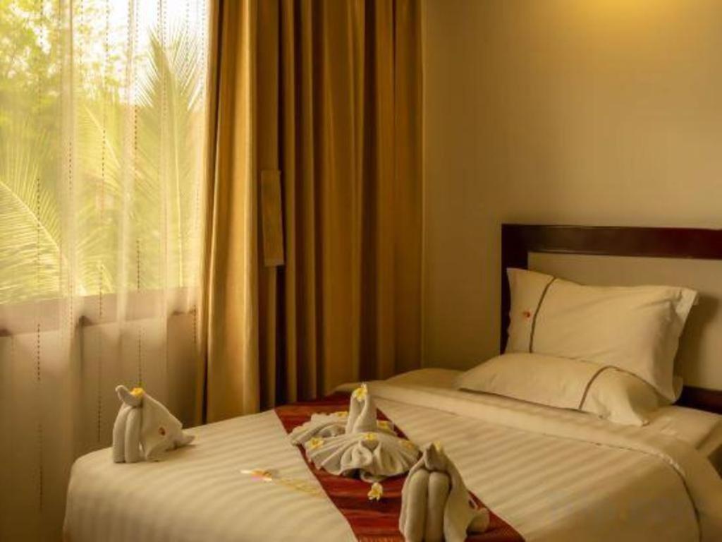 Xishuangbanna Hotel Managed By Xandria Hotel Luang Prabang Eksteriør billede
